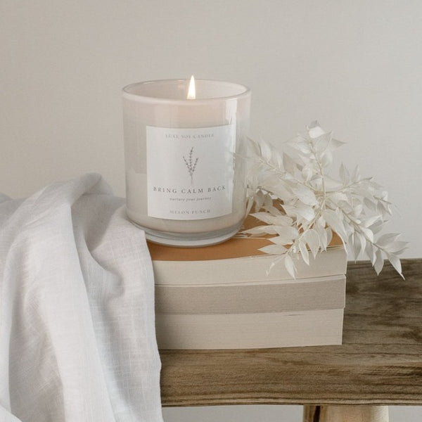 Feel the summer vibes with our Melon Punch Candle, as you soak in the warm sunshine and reminisce on carefree nights with friends. The sweet blend of melon, lemon, and blackberry, mixed with hints of sea breeze and vanilla bean, creates a refreshing and uplifting scent that will brighten any space.